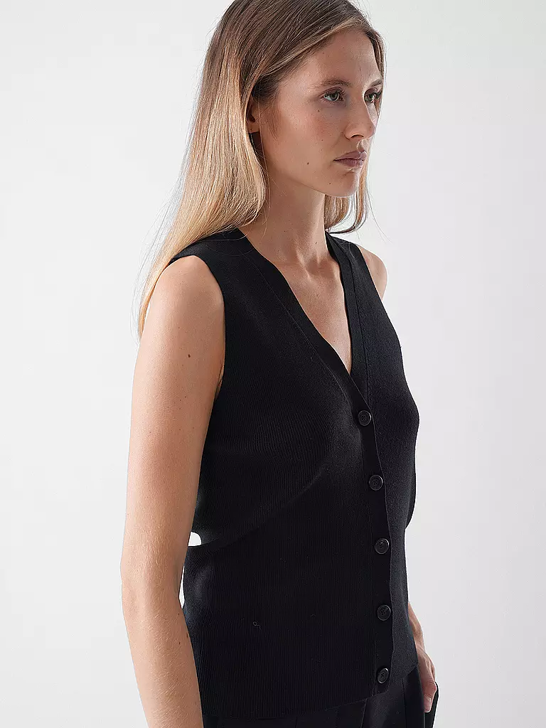 ANINE BING | Gilet
Marque : ANINE BING
Couleur : noir
Catégories : Mode, Femme

Longueur des manches : sans manches
Encolure : Col rond
Matière : Laine vierge, Laine, Mérinos, Tricot, Soie
Motif : Uni
Coupe (vêtements d'extérieur) : Standard
Style : Pure | 