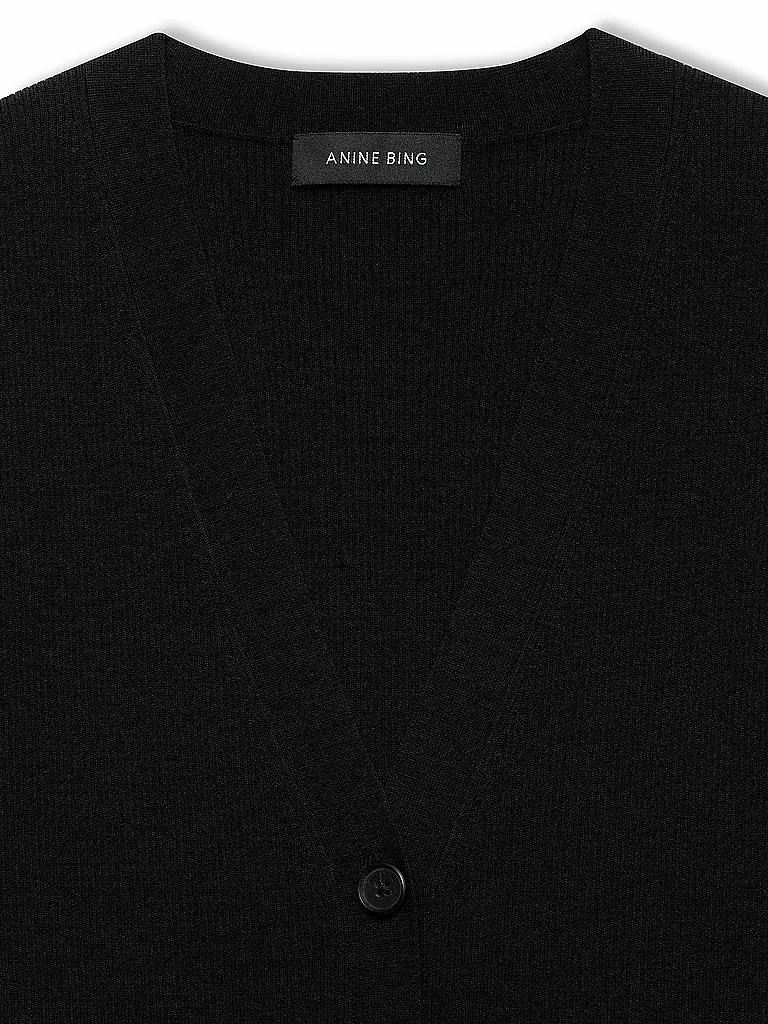 ANINE BING | Gilet
Marque : ANINE BING
Couleur : noir
Catégories : Mode, Femme

Longueur des manches : sans manches
Encolure : Col rond
Matière : Laine vierge, Laine, Mérinos, Tricot, Soie
Motif : Uni
Coupe (vêtements d'extérieur) : Standard
Style : Pure | 