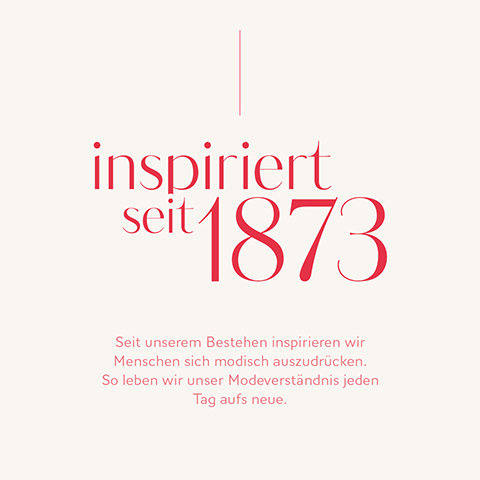 Le texte en rouge sur fond clair se lit comme suit : « inspiré depuis 1873 ». Le texte supplémentaire ci-dessous est le suivant : « Depuis notre création, nous inspirons les gens à s'exprimer à travers la mode. C'est ainsi que nous vivons notre compréhension de la mode chaque jour. »