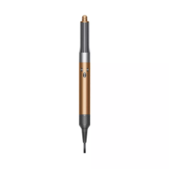 Un appareil de coiffure doré et noir avec un corps cylindrique, une poignée ergonomique et un cordon d'alimentation connecté. L'appareil a un design élégant et moderne avec deux boutons sur le corps et une poignée texturée en bas.