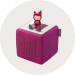 Ein magentafarbener Toniebox-Audioplayer mit einer passenden Figur auf der Oberseite, die ein Katzenohr-Design und ein gepunktetes Katzengesichts-Lautsprechermuster an der Seite aufweist, platziert auf einem weißen Hintergrund.