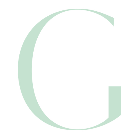 Une grande lettre majuscule "G" vert clair sur un fond blanc.