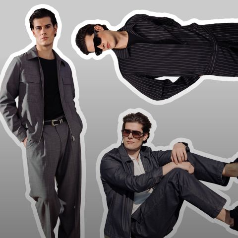 Trois hommes posent dans des costumes élégants : l'un debout en gris, l'un allongé en rayures noires et l'un assis avec des lunettes de soleil et une tenue anthracite.