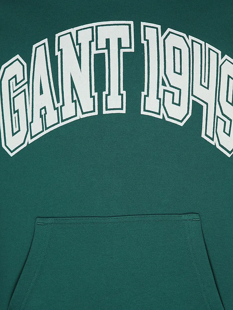 GANT | Nom du produit : Sweat à capuche - Hoodie
Marque : GANT
Couleur : vert
Catégories : Mode, Homme

Longueur des manches : Manches longues
Matière : Molleton, Coton
Forme du col : Capuche
Motif : Logo, Imprimé
Coupe (vêtements d'extérieur) : Regular
St | Vert