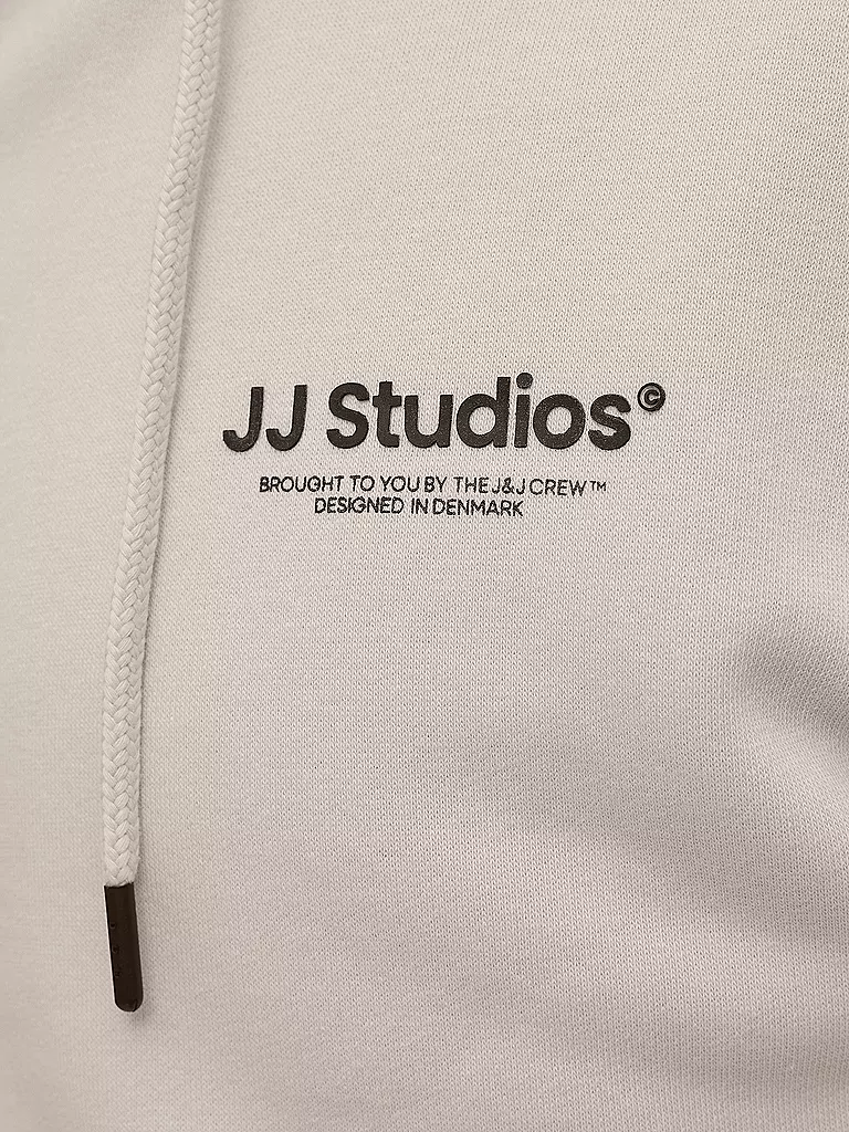 JACK & JONES | Sweatjacke
Marque : JACK & JONES
Couleur : crème
Catégories : Mode, Homme

Longueur des manches : Manches longues
Matière : Molleton, Coton
Forme du col : Capuche
Motif : Uni
Coupe (vêtements d'extérieur) : Ample
Détails : Cordon de serrage, Poches | 