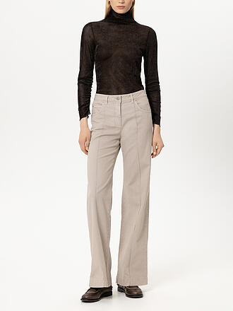 LUISA CERANO | Col roulé