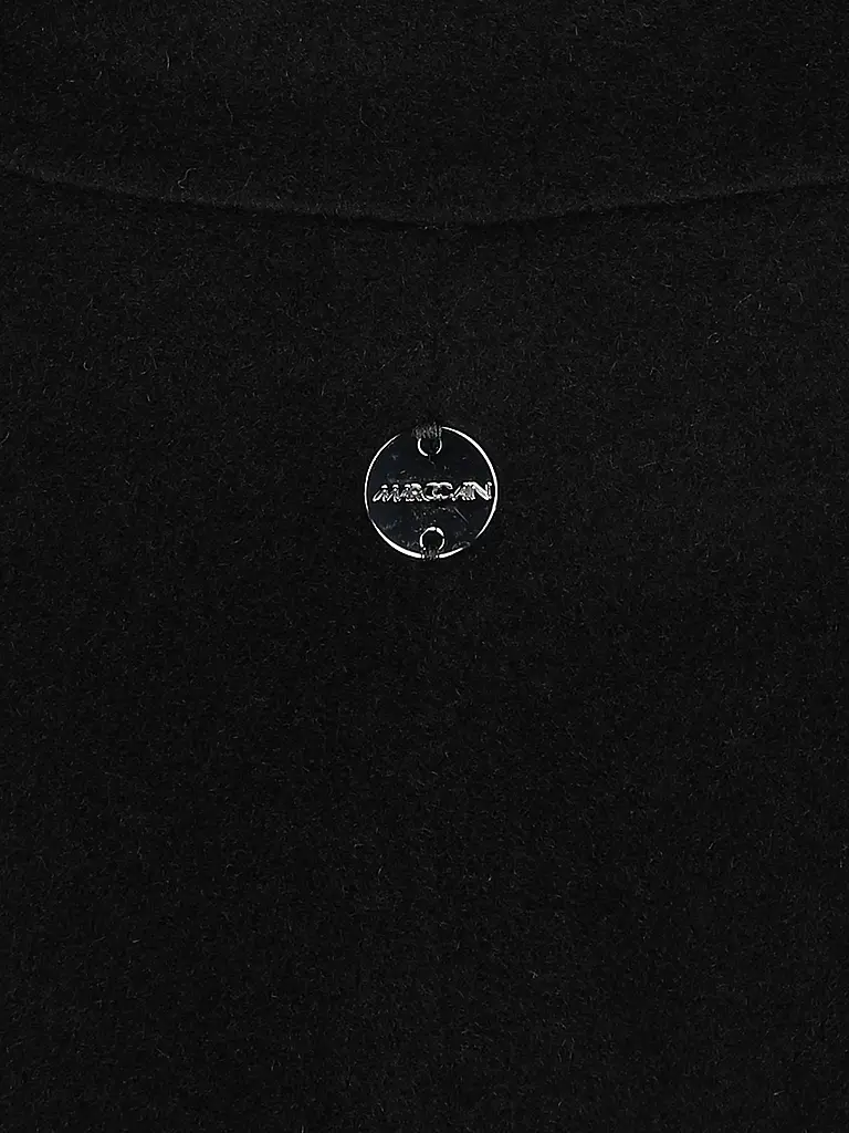 MARC CAIN | Nom du produit: Manteau en laine
Marque: MARC CAIN
Couleur: noir
Catégories: Mode, Femme

Longueur des manches: Manches longues
Matière: Alpaga
Forme du col: Col à revers
Motif: Uni
Coupe (vêtements d'extérieur): Ample
Style: Glamour
Détails: Poches | 