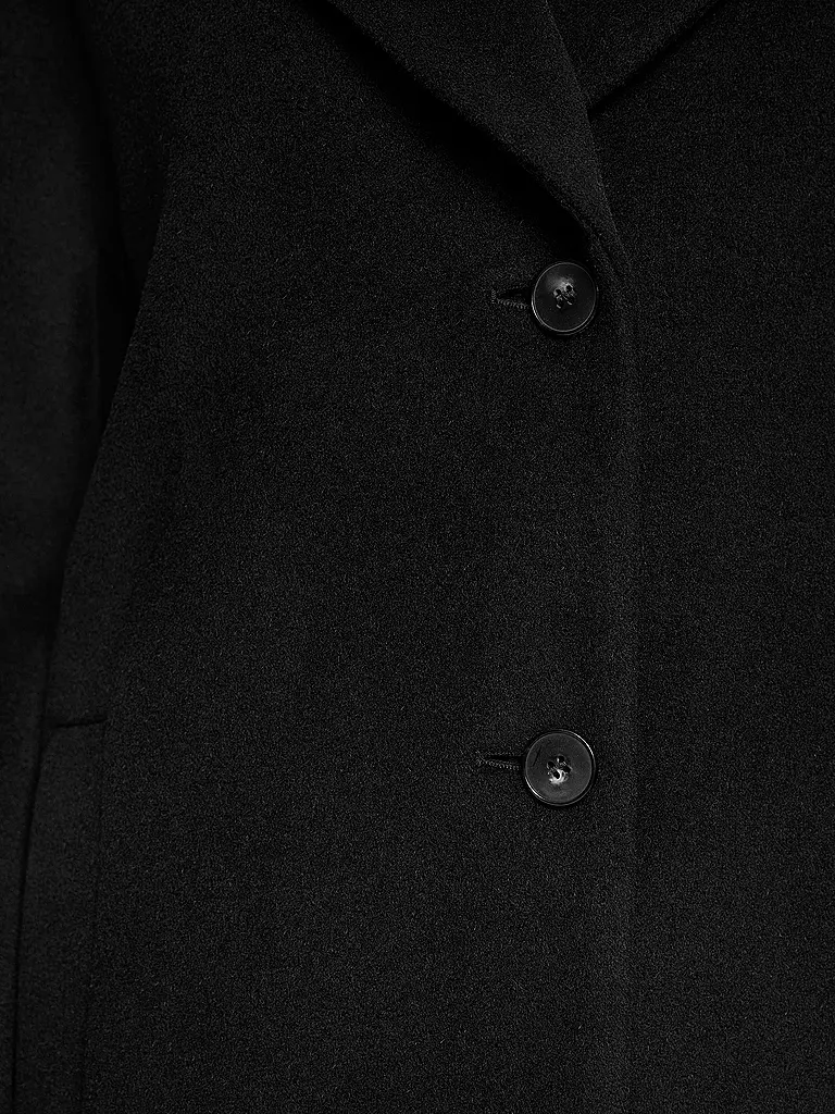 MARC CAIN | Nom du produit: Manteau en laine
Marque: MARC CAIN
Couleur: noir
Catégories: Mode, Femme

Longueur des manches: Manches longues
Matière: Alpaga
Forme du col: Col à revers
Motif: Uni
Coupe (vêtements d'extérieur): Ample
Style: Glamour
Détails: Poches | 