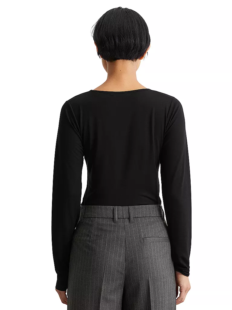 MARC O'POLO | Langarmshirt
Marque : MARC O'POLO
Couleur : noir
Catégories : Mode, Femme

Longueur des manches : Manches longues
Encolure : Col rond
Matière : Jersey, Lyocell, Tencel
Motif : Uni
Coupe (vêtements d'extérieur) : Regular
Style : Casual, Pure | 