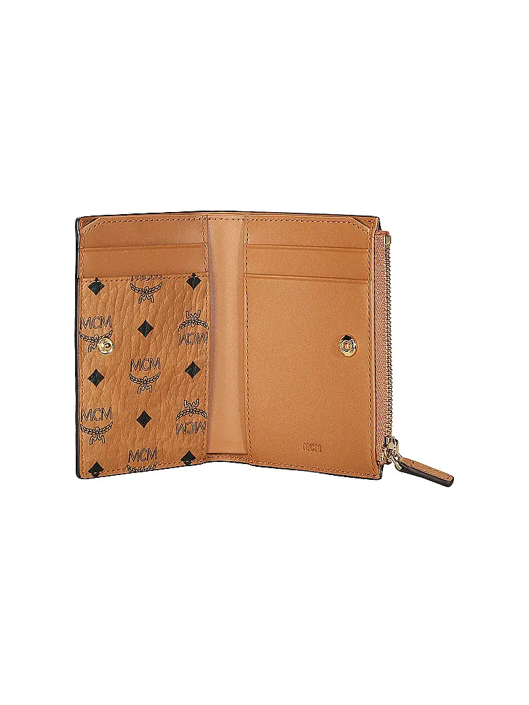 MCM | Nom du produit: Portefeuille AREN Small
Marque: MCM
Couleur: marron
Catégories: Mode,Femme

Matériel: Toile
Motif: All Over,Logo
Style: Tendance | Marron