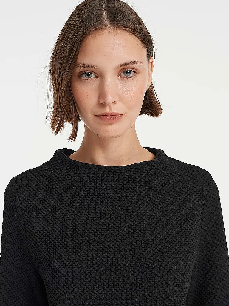 OPUS | Nom du produit : Sweater GASDINA
Marque : OPUS
Couleur : noir
Catégories : Mode,Femme

Longueur des manches : Manches longues
Matière : Polyester / Polyamide,Viscose ,Stretch
Forme du col : Col montant
Motif : Uni
Coupe (vêtements d'extérieur) : Ample | Noir