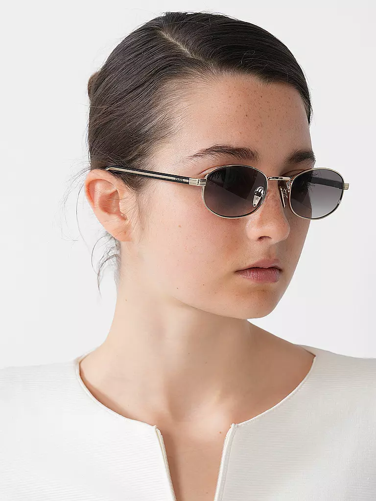 PRADA | Nom du produit : Lunettes de soleil
Marque : PRADA
Couleur : or
Catégories : Mode, Femme

Matière : Métal | Or