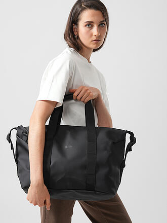 RAINS | Nom du produit : Ensemble 2 pièces Sac de voyage Weekender et Trousse de toilette