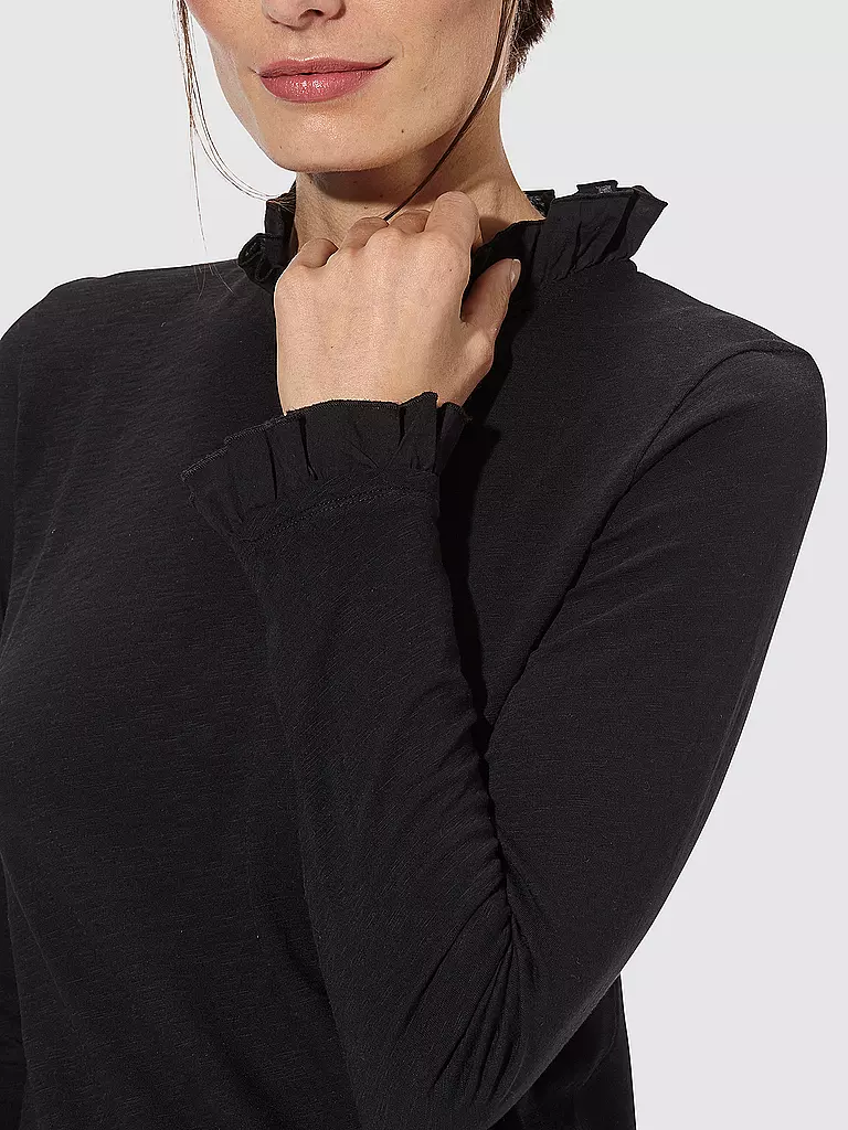 RICH & ROYAL | Langarmshirt
Marque : RICH & ROYAL
Couleur : noir
Catégories : Mode,Femme

Longueur des manches : Manches longues
Matière : Coton,Jersey
Forme du col : Col montant
Motif : Uni
Coupe (vêtements d'extérieur) : Slim
Style : Glamour
Détails : Volants | 