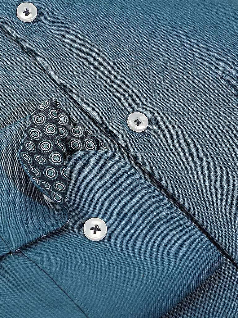 SEIDENSTICKER | Chemise business
Marque: SEIDENSTICKER
Couleur: pétrole
Catégories: Mode, Homme

Longueur des manches: Manches longues
Matière: Coton
Forme du col: Col Kent
Motif: Uni
Coupe (vêtements d'extérieur): Regular
Détails: Poches latérales | Pétrole