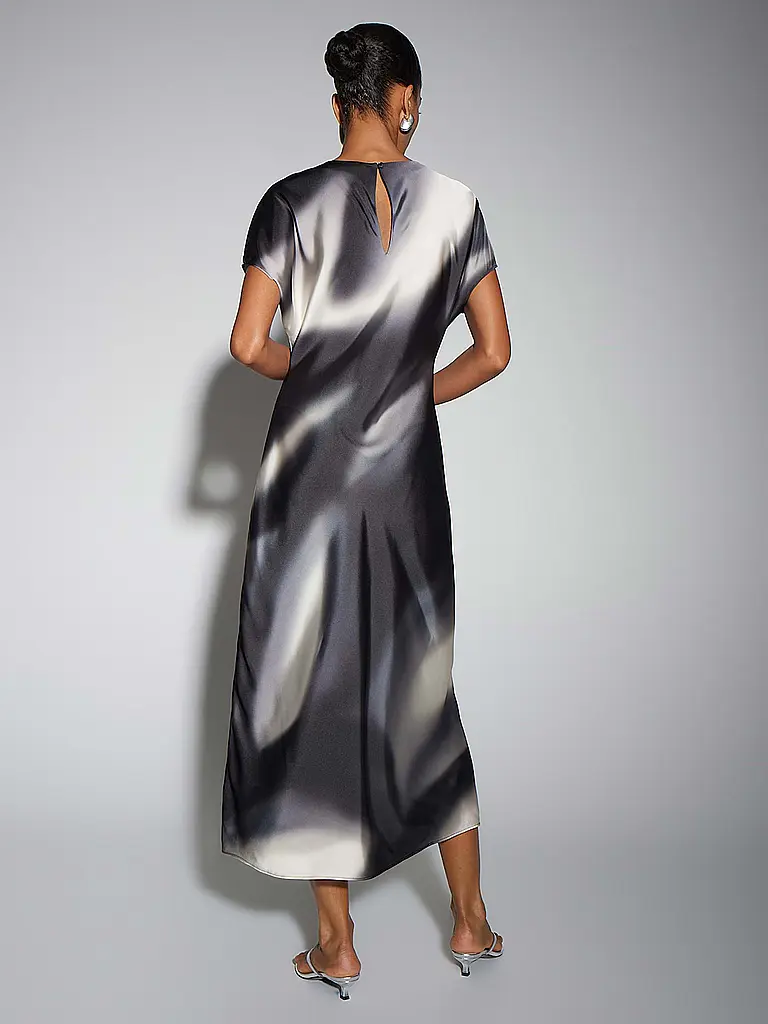 SOMEDAY | Midikleid QUIMMA
Marke: SOMEDAY
Farbe: schwarz
Kategorien: Mode,Damen

Ärmellänge: Angeschnittener Arm
Ausschnitt: Rundhalsausschnitt
Material: Polyester / Polyamid
Musterung: Allover
Passform (Oberbekleidung): Locker
Style & Anlass: Freizeit
Stil: Pure | 