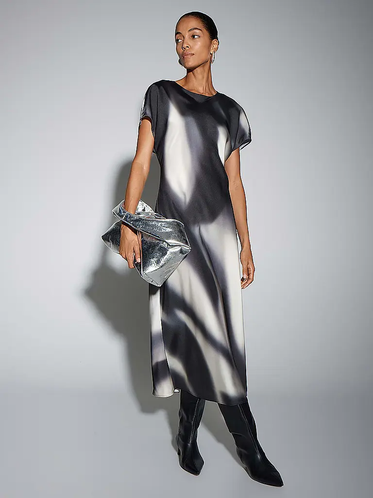 SOMEDAY | Midikleid QUIMMA
Marke: SOMEDAY
Farbe: schwarz
Kategorien: Mode,Damen

Ärmellänge: Angeschnittener Arm
Ausschnitt: Rundhalsausschnitt
Material: Polyester / Polyamid
Musterung: Allover
Passform (Oberbekleidung): Locker
Style & Anlass: Freizeit
Stil: Pure | 