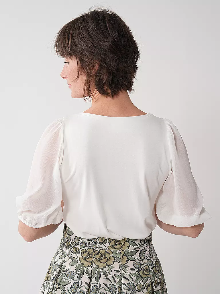 WENGER | Blusenshirt INN
Marke: WENGER
Farbe: creme
Kategorien: Mode,Damen

Ärmellänge: 3/4 Ärmel
Ausschnitt: Rundhalsausschnitt
Material: Jersey,Chiffon,Stretch,Viskose ,Mix
Musterung: Unifarben
Passform (Oberbekleidung): Regular | Crème